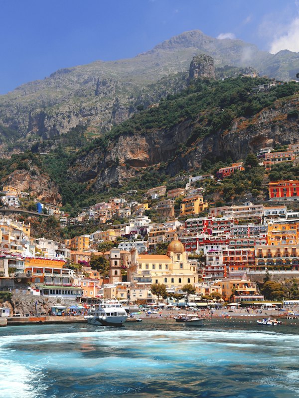 Houses stacked on the cliffside above the sea in Positano